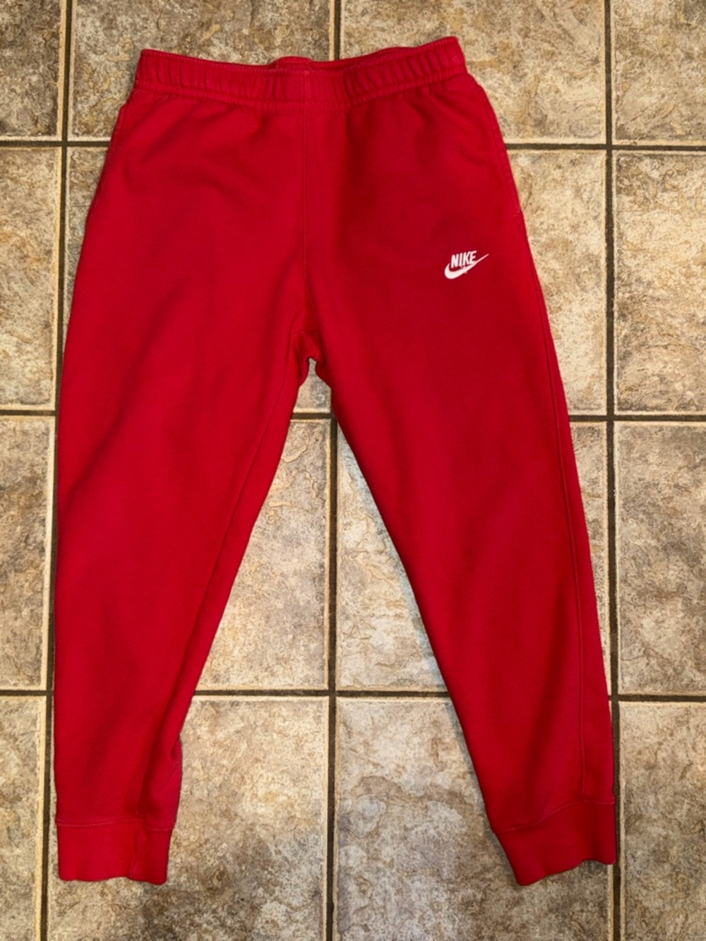 Nike men's Red Fleece Jogger Pants with White Swoosh
